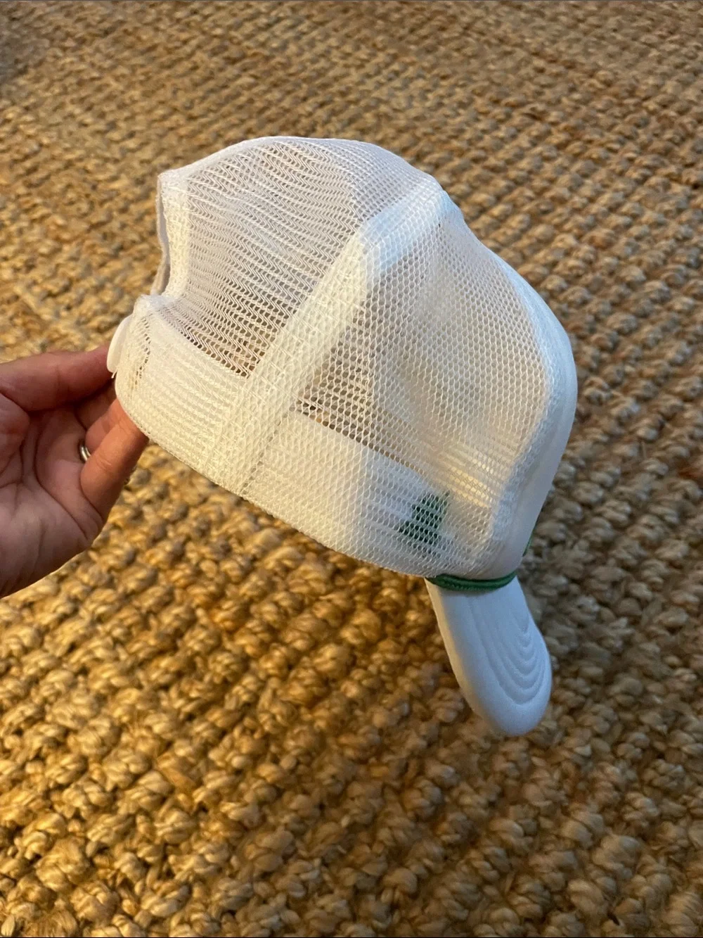 White Trucker Hat with Green Script Accent